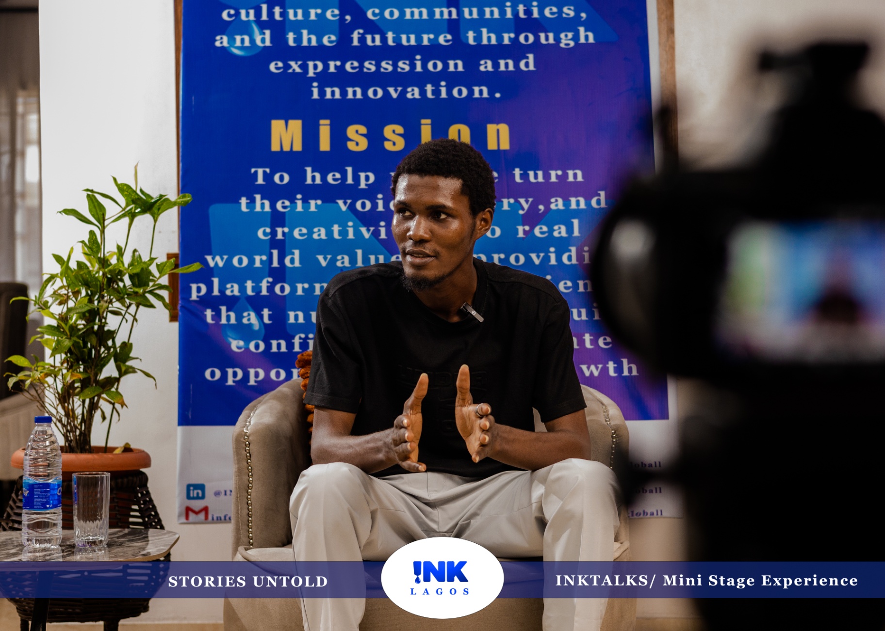 Virtue David speaking on the INK Talks Stories Untold mini stage