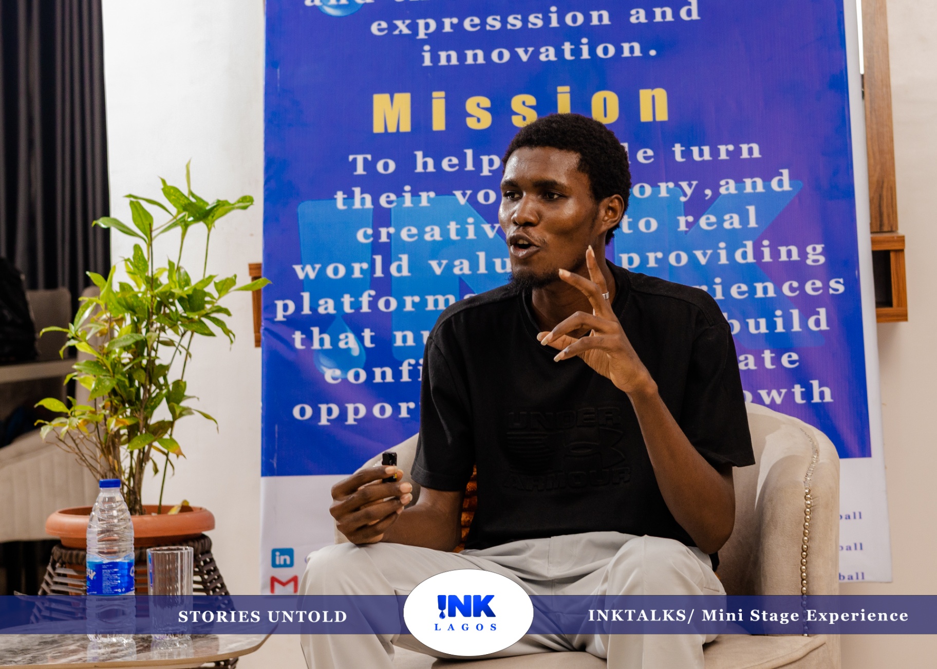 Virtue David mid-sentence during the INK Talks fireside conversation